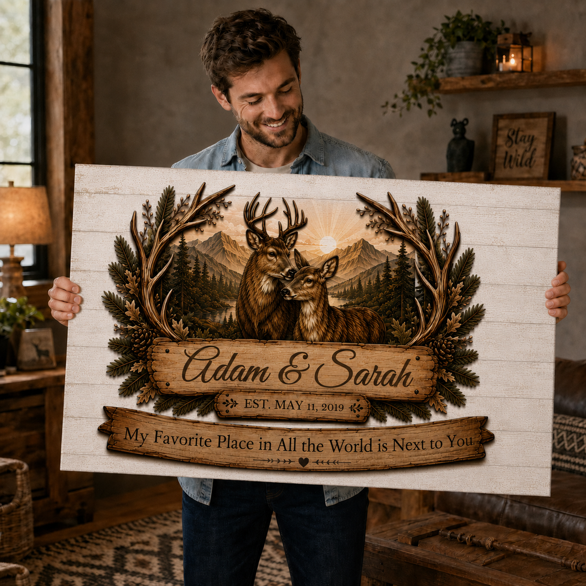 Man holding a personalized deer couple canvas
